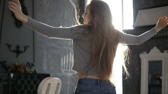 Girl Is Dancing at Home alt