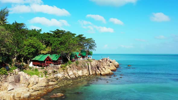Aerial view scenery of perfect seashore beach time by blue green water and white sand background of  alt