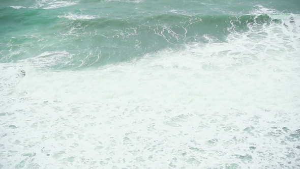 a Large Foamy Wave in the Sea