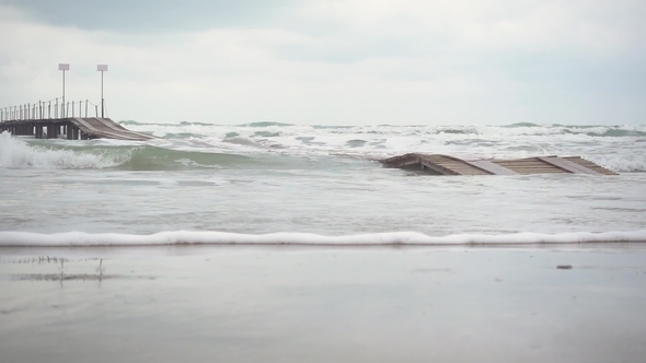 Wooden Pier Under the Sea in a Storm