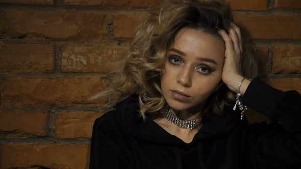 Girl Is Looking in the Camera alt