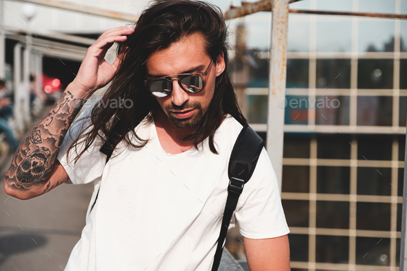 Attractive bearded man portrait with sunglasses - Stock Photo - Images