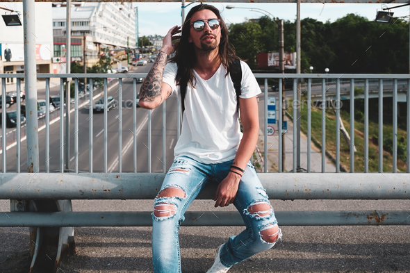 Stylish man with sunglasses and beard - Stock Photo - Images