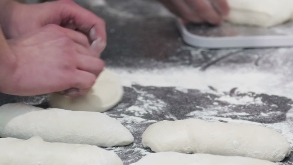 Cook Kneads the Dough and Gives