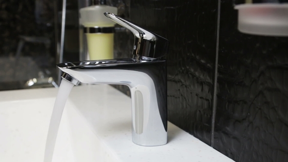 Water Faucet in a Luxurious Hotel Room or at Home