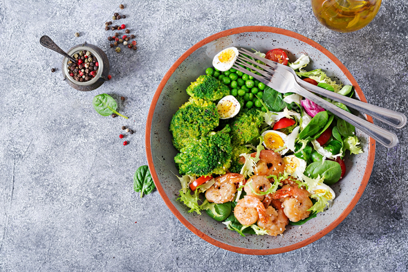 Fresh seafood recipe. Grilled shrimps and fresh vegetable salad, egg and broccoli. - Stock Photo - Images
