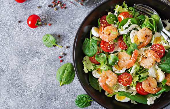 Grilled shrimps and fresh vegetable salad and egg. Grilled prawns. - Stock Photo - Images