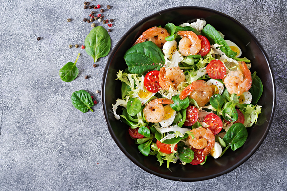 Grilled shrimps and fresh vegetable salad and egg. Grilled prawns. - Stock Photo - Images