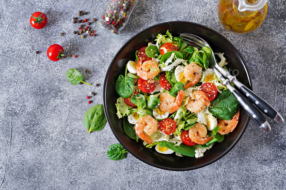Grilled shrimps and fresh vegetable salad and egg. Grilled prawns. - Stock Photo - Images