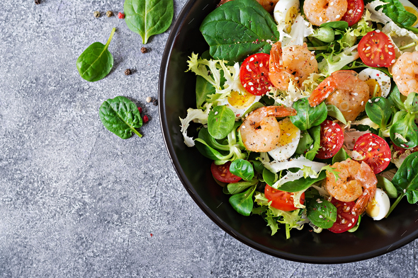 Grilled shrimps and fresh vegetable salad and egg. Grilled prawns - Stock Photo - Images