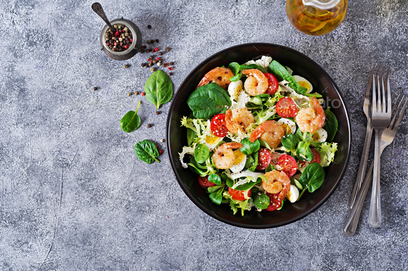Grilled shrimps and fresh vegetable salad and egg. Grilled prawns. - Stock Photo - Images