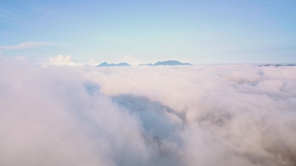 Aerial Mount Agung Volcano View Thru Clouds Bali, Indonesia. alt