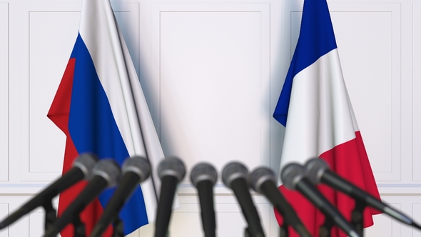 Flags Of Russia And France At International Press Conference Motion Graphics