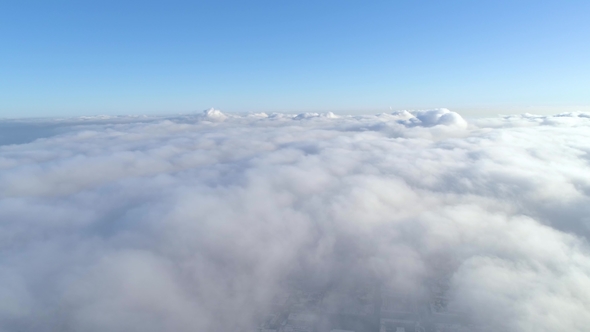 Winter Drone Shot Above the Clouds of the Minsk City Residential Buildings alt