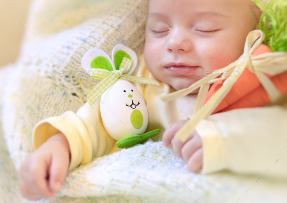 Baby boy with Easter bunny - Stock Photo - Images