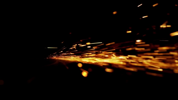 Fiery Sparks Fly Against a Black Background