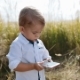 Cute Toddler-boy Stands in the Middle of High-grass and Uses Smartphone. Positive Emotions, Modern - VideoHive Item for Sale