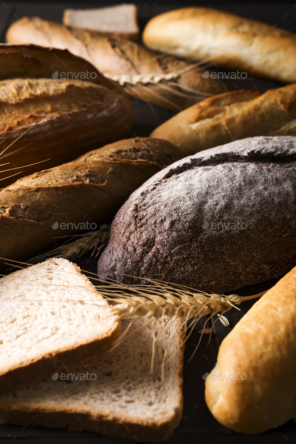 Top view of different kinds of bread with cereals isolated - Stock Photo - Images