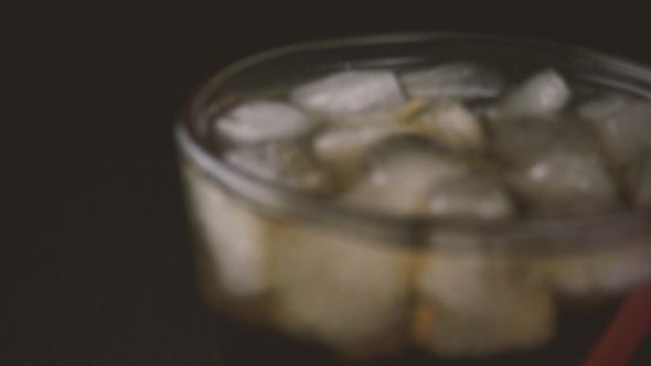 Camera Moves and the Ice in the Drink Becomes in Focus