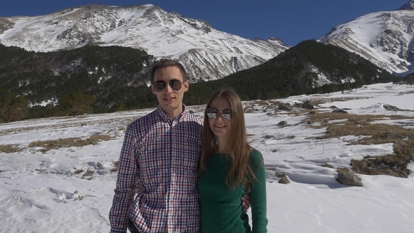 Couple of Young Newlyweds in the Mountains on a Honeymoon