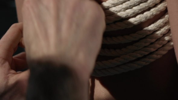 Shibari Master Tying Rope on a Girl Back Video
