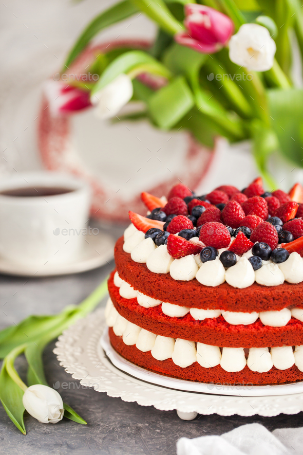 Delicious Homemade Red Velvet Cake Decorated With Cream And Fres