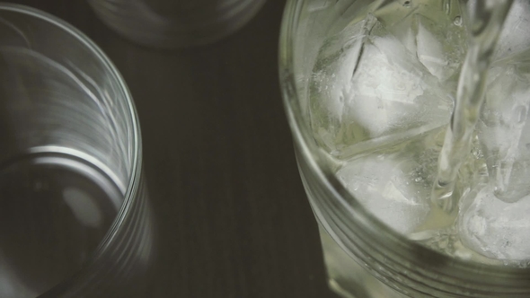 Green Tea Pours Into the Glass