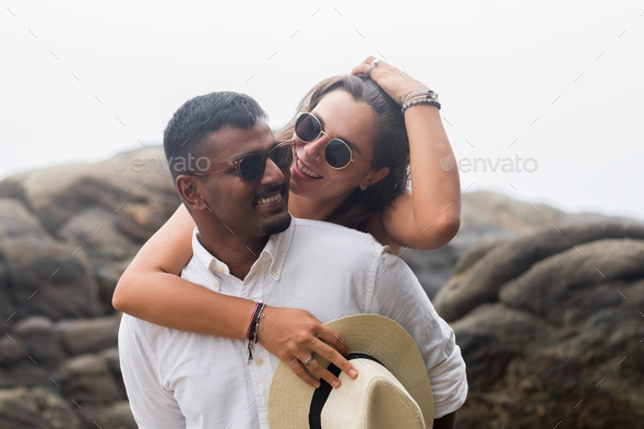 portrait of loving young couple at the beach. They are happy and smile. - Stock Photo - Images