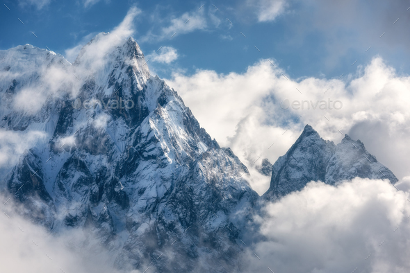 Mountains with snowy peaks in clouds in Nepal - Stock Photo - Images