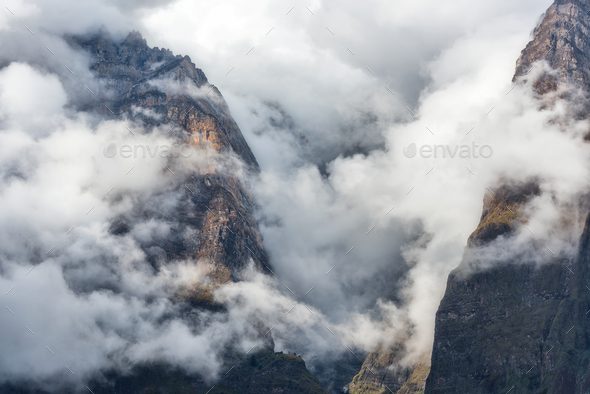 Mountains in low clouds in the evening in Nepal - Stock Photo - Images