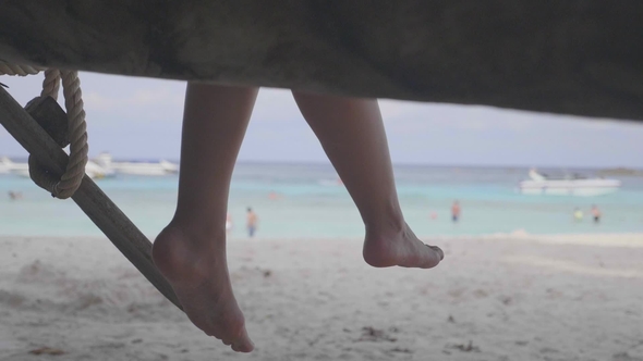 Woman's Feet on the Beach