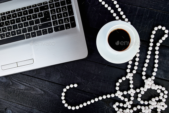 Modern women workplace with notebook or laptop. - Stock Photo - Images