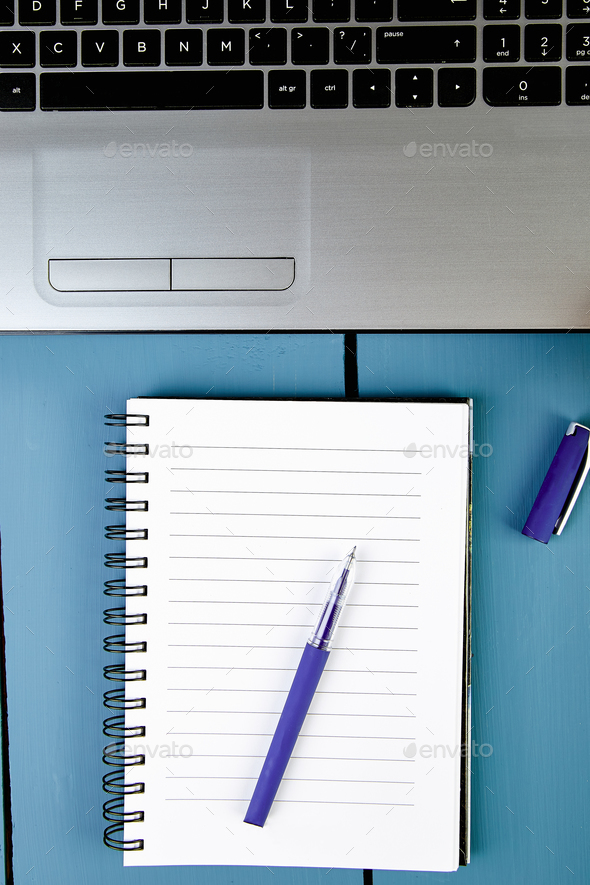 Modern women workplace with notebook or laptop. - Stock Photo - Images