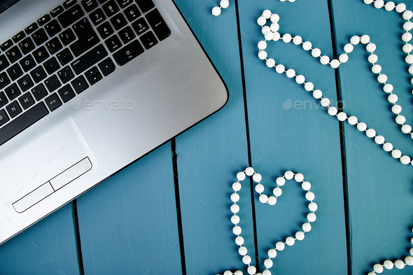 Modern women workplace with notebook or laptop. - Stock Photo - Images