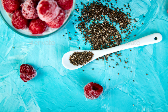 Healthy chia pudding with raspberries in glass - Stock Photo - Images