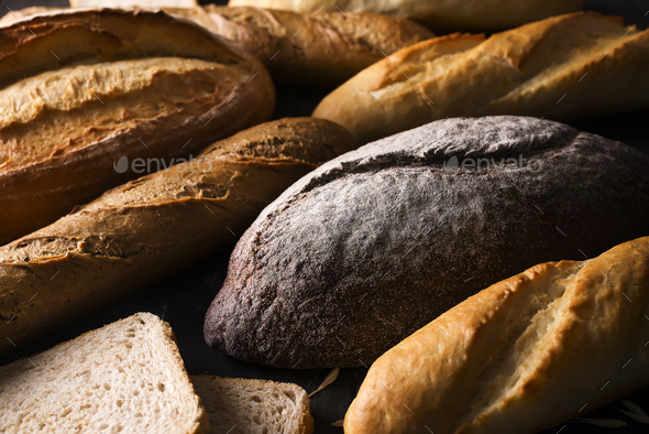 Top view of different kinds of bread with cereals isolated - Stock Photo - Images