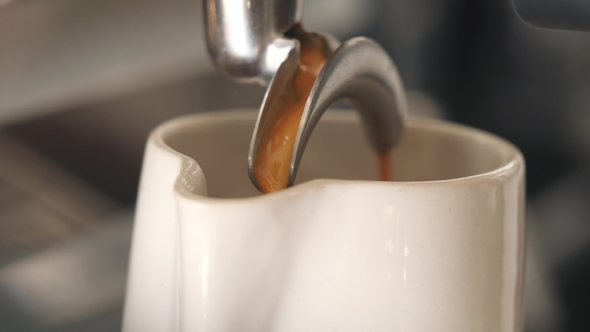 Process of Making Fresh Coffee on Professional Machine.