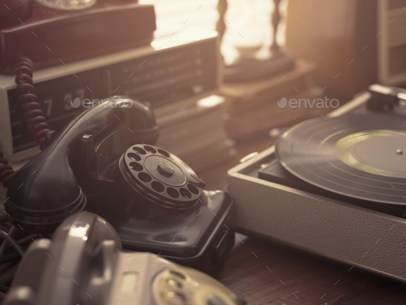Vintage objects collection next to a window - Stock Photo - Images