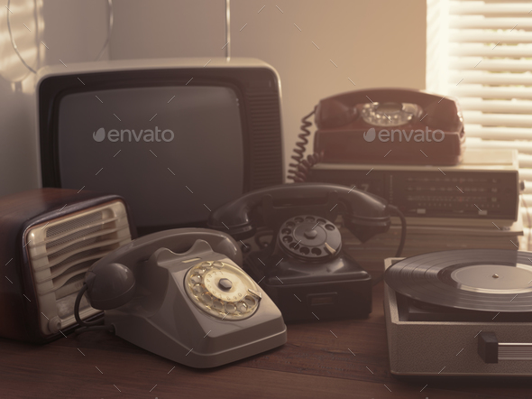Vintage objects collection next to a window - Stock Photo - Images