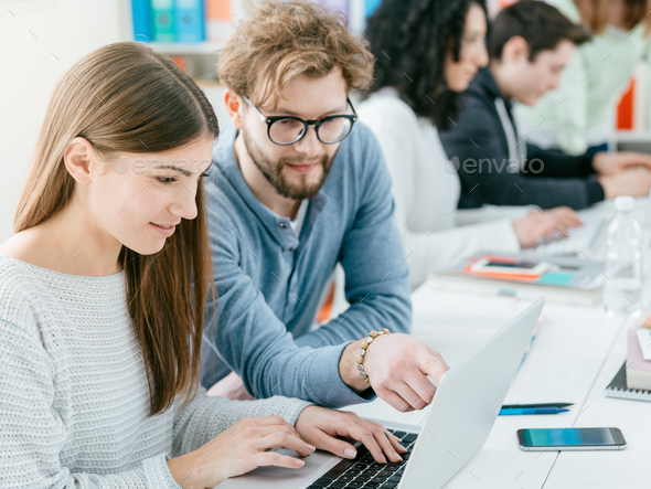 University students studying together - Stock Photo - Images
