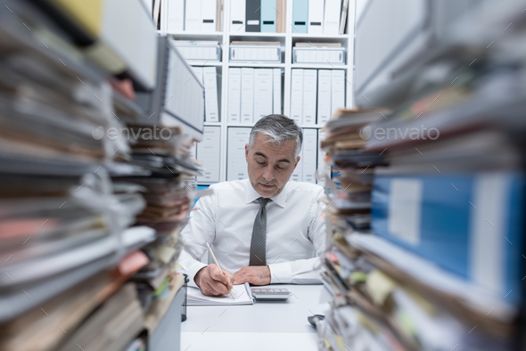 Manager overloaded with work - Stock Photo - Images