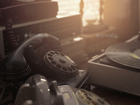 Vintage objects collection next to a window - Stock Photo - Images