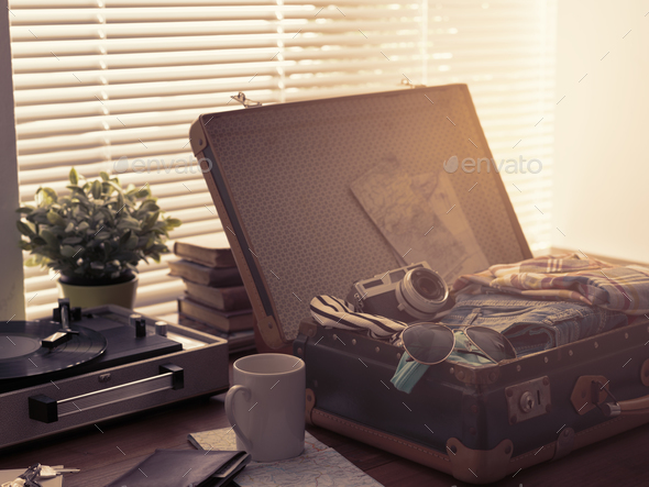 Traveler packing his suitcase before leaving - Stock Photo - Images