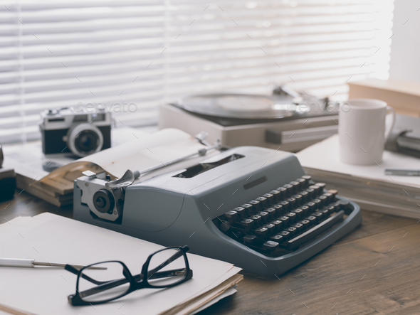Writer and journalist vintage desktop with typewriter - Stock Photo - Images