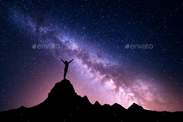 Milky Way with silhouette of a standing sporty girl - Stock Photo - Images
