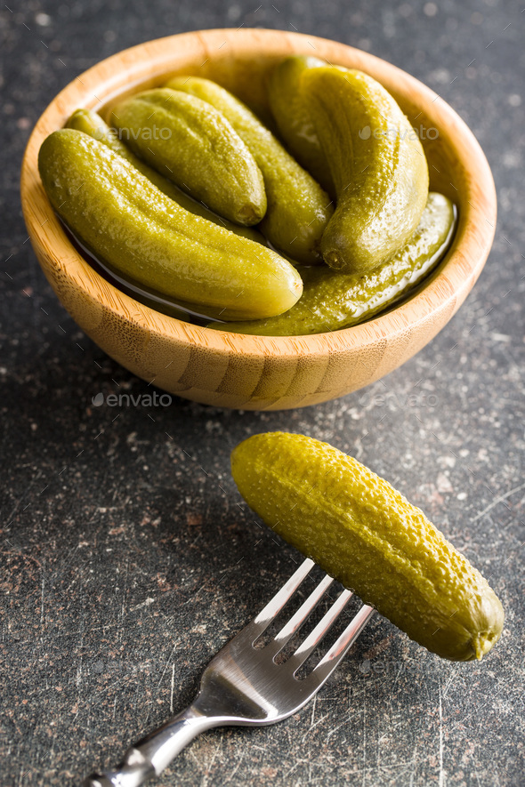 Pickles in bowl. Preserved cucumbers. - Stock Photo - Images