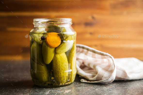 Pickles in bowl. Tasty preserved cucumbers. - Stock Photo - Images