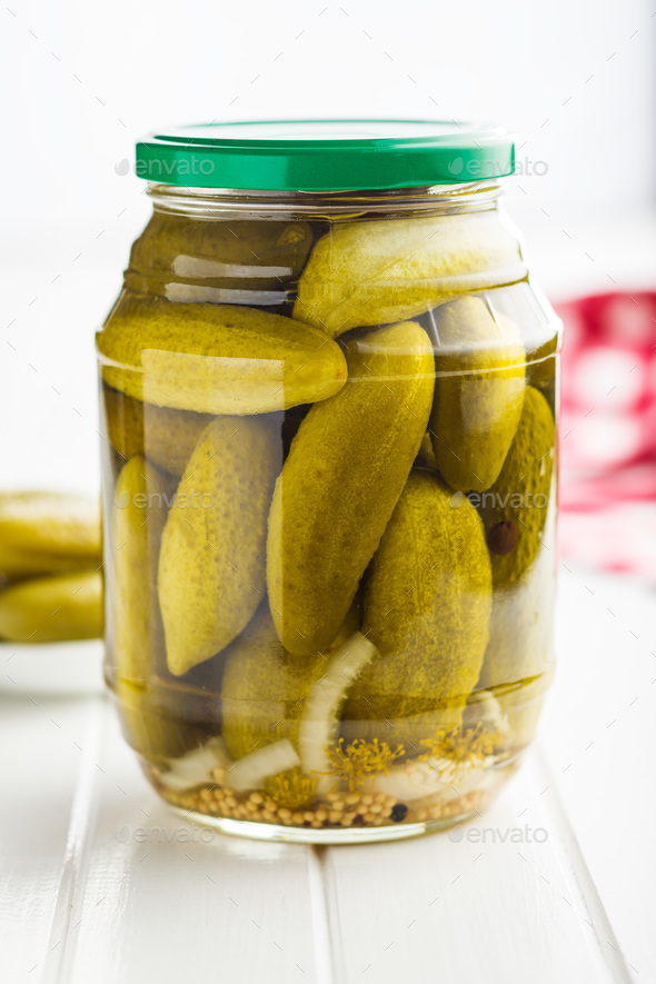 Pickles in bowl. Tasty preserved cucumbers. - Stock Photo - Images