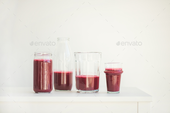 Fresh morning beetroot smoothie or juice in glasses, copy space - Stock Photo - Images