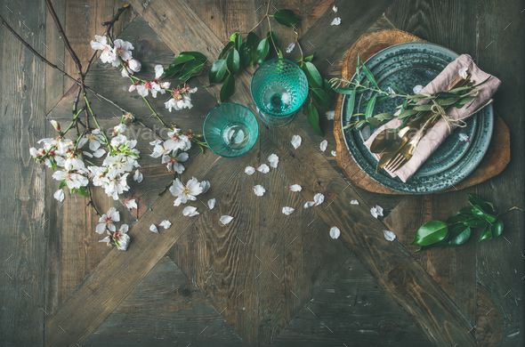 Flat-lay of Spring Easter Table setting with almond blossom flowers - Stock Photo - Images
